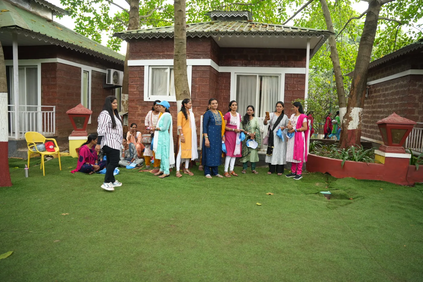 Team gathered on the resort lawn between activities
